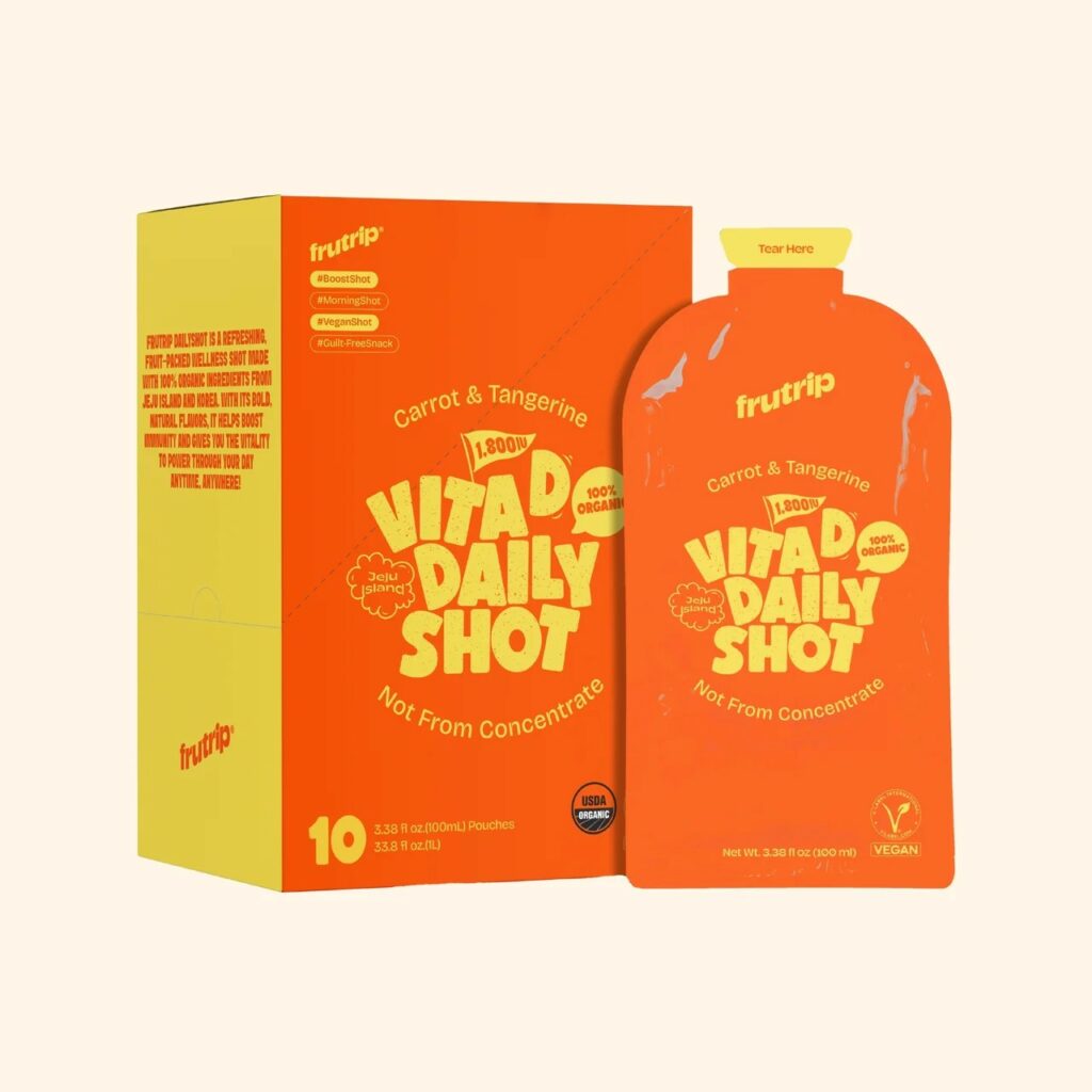 FRUTRIP Vita-D Daily Shot à la carotte et à la mandarine, boîte et sachet